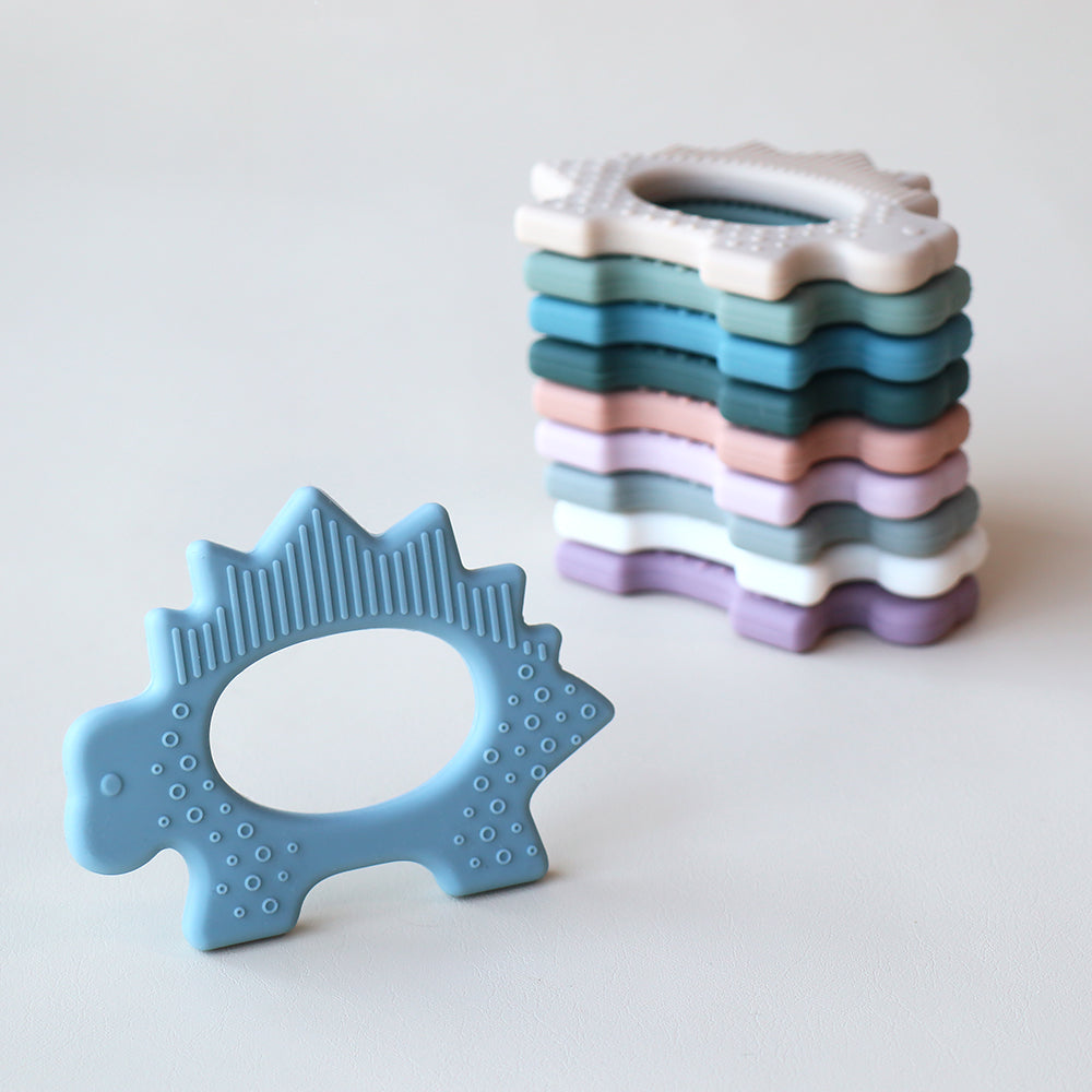 Juguete de dentición de dinosaurio