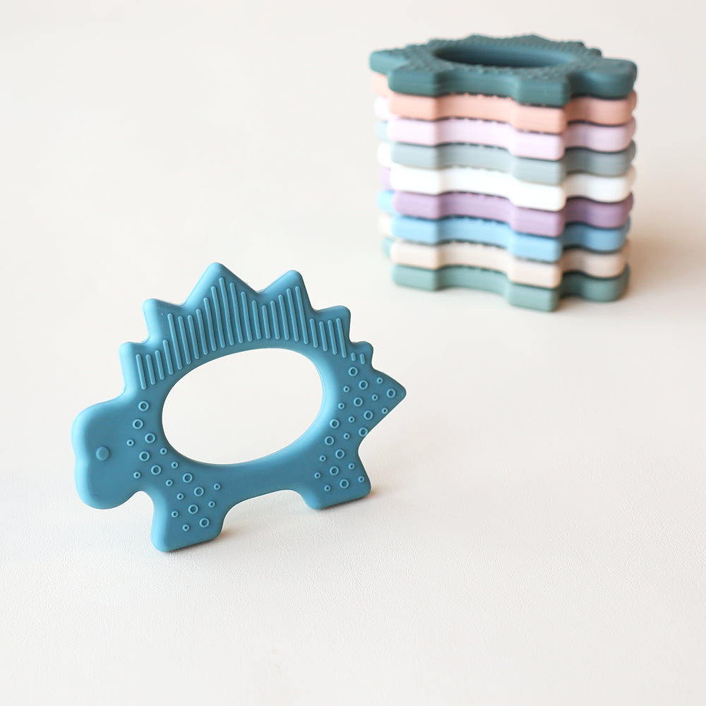 Juguete de dentición de dinosaurio