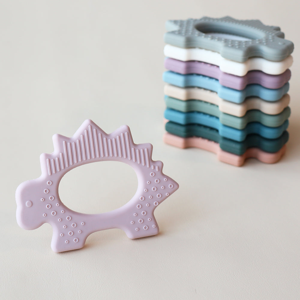 Juguete de dentición de dinosaurio