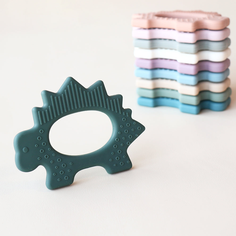 Juguete de dentición de dinosaurio