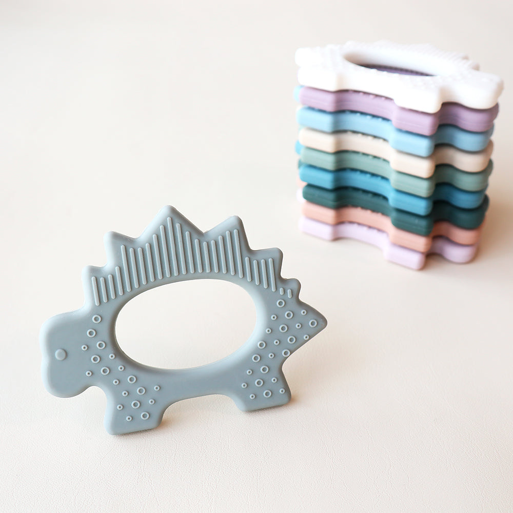 Juguete de dentición de dinosaurio