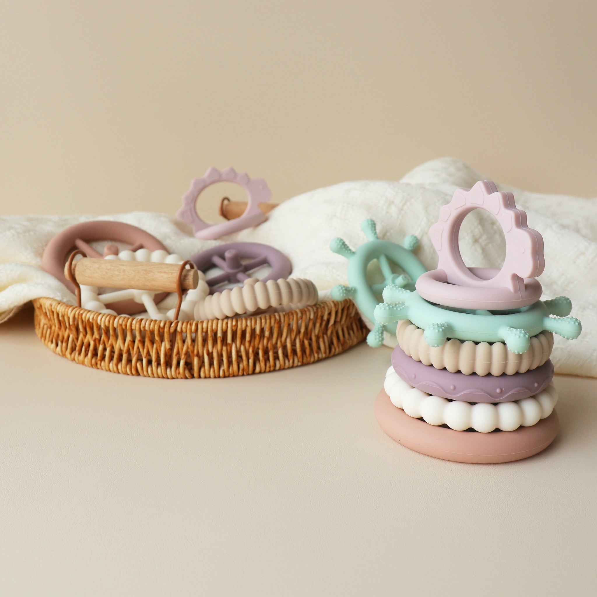 girls stacking teething toy dinosaur