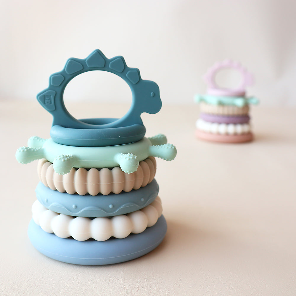 Juguete apilable de dinosaurios