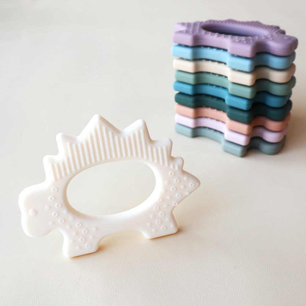 Juguete de dentición de dinosaurio