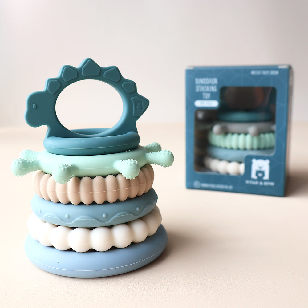 Juguete apilable de dinosaurios