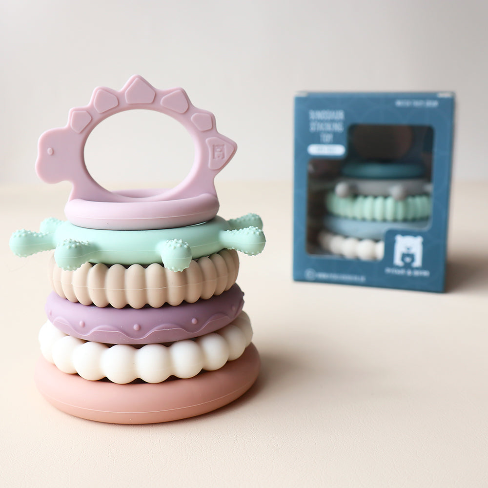 Juguete apilable de dinosaurios