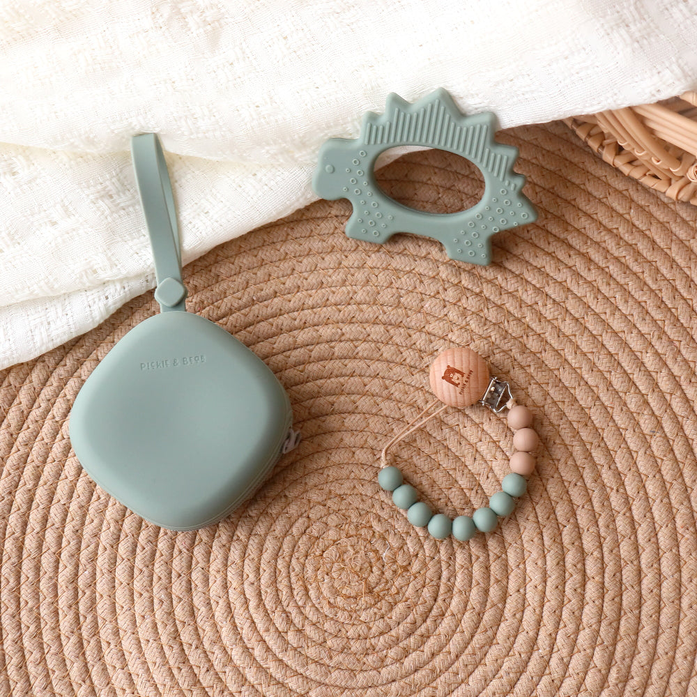 baby pacifier travel set with dinosaur teething toy pale olive